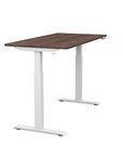 Side view of the SitonIt Switchback Height Adjustable Sit-to-Stand Desk. It has a White base with a 27"D x 54"W walnut top - Kansas City Office Furniture