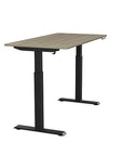 Side view of the SitonIt Switchback Height Adjustable Sit-to-Stand Desk. It has a Black base with a 27"D x 54"W Sandalwood top - Kansas City Office Furniture