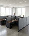 Modern office layout with L-shaped desk and partitioned AIS Divi Fast Track workstations. Kansas City Office Design