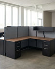 Modern office desk with partition walls in a bright room. Kansas City Office Design.