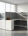 Modern office desk with gray partition walls in a bright room. Kansas City Office Design