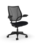 Side view of Humanscale Liberty desk chair showing breathable mesh back and Adjustable Duron armrests. Black Fabric, Black Frame, Black Mesh. Kansas City Office Furniture