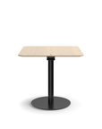 Humanscale Float Gather 30" square Table in black base with white oak veneer top in sitting position. Kansas City Office Design.
