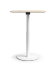 Humanscale Float Gather 30" square Table in white base with white oak veneer top in standing position. Kansas City Office Design.