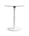 Humanscale Float Gather 36" round Table in white base with white laminate top in standing position. Kansas City Office Design.