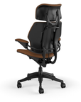 Freedom Ergonomic Executive Chair with Headrest, Black, Saddle Leather (Corvara), side view. Kansas City Office Design.