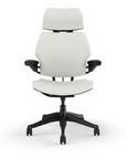 Front view of the HumanScale Freedom with Headrest in a white polyurethane fabric with black frame. Kansas City Office Furniture.