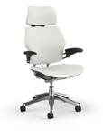 Side view of the HumanScale Freedom with Headrest in a white polyurethane fabric with polished aluminum frame. Kansas City Office Furniture.