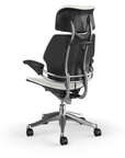 Back view of the HumanScale Freedom with Headrest in a white polyurethane fabric with polished aluminum frame. Kansas City Office Furniture.