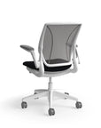 Humanscale World Chair with black mesh, white frame, black fabric, back view. Kansas City Office Design