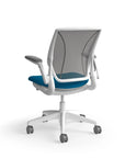 Humanscale World Chair with black mesh, white frame, peacock blue fabric, back view. Kansas City Office Design
