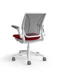 Humanscale World Chair with black mesh, white frame, Parma Red fabric seat, back view. Kansas City Office Design