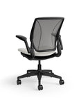Humanscale World Chair with black mesh, black frame, white polyurethane lotus fabric seat, back view. Kansas City Office Design