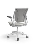 Humanscale World Chair with black mesh, white frame, white polyurethane lotus fabric seat, back view. Kansas City Office Design