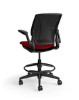 Humanscale World LM counter-height stool in parma red seat and black frame, three-quarter view