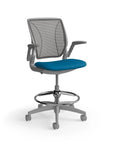 Humanscale World Stool with black mesh, gray frame, peacock blue fabric seat, side view. Kansas City Office Design