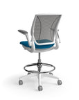 Humanscale World Stool with black mesh, white frame, peacock blue fabric seat, back view. Kansas City Office Design