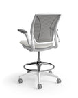 Humanscale World Stool with black mesh, white frame, white polyurethane lotus fabric seat, back view. Kansas City Office Design