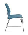 Side view of a SitOnIt Lumin sled base Stack Chair in lagoon color with chrome frame. Kansas City Office Design.
