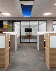 Modern office with wooden cubicles and glass partitions. Kansas City Office Design