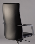 Black office chair with chrome armrests on a gray background. Kansas City Office Design