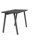 Side view of the SitOnIt Reya Office Desk with Angled Metal Legs. The legs are black with a black top. Kansas City Office Furniture