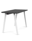 Side view of the SitOnIt Reya Office Desk with Angled Metal Legs. The legs are white with a black top. Kansas City Office Furniture