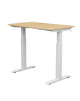 Back view of the SitonIt Switchback Height Adjustable Sit-to-Stand Desk. It has a White base with a 24"D x 42"W Maple top - Kansas City Office Furniture