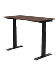 Back view of the SitonIt Switchback Height Adjustable Sit-to-Stand Desk. It has a Black base with a 24"D x 48"W Walnut top - Kansas City Office Furniture