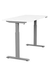Side view of the SitonIt Switchback Height Adjustable Sit-to-Stand Desk. It has a Silver base with a 27"D x 54"W White top - Kansas City Office Furniture