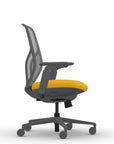 Side view of the 9to5 Tori Midback ergonomic task chair in gray frame, yellow fabric, and gray mesh. Kansas City Office Design.