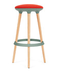 Via Joi Bar stool with Red seat, green Poly trim, and wood base on a white background. Kansas City Office Design.