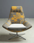 Modern Via Astro Lounge chair with gray and yellow pattern on a neutral background. Kansas City Office Design.
