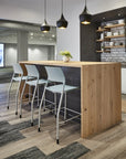 Modern kitchen with wooden island and AIS Pierce barstools in a stylish interior setting. Kansas City Office Design