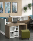 Modern office setup with a L-shaped desk, chairs, and decor elements. Kansas City Office Design