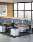 Modern office setup with desks, chairs, and a large window view. Kansas City Office Design