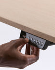 Humanscale eFloat Go 2.0 Sit-Stand Desk with bamboo top and white base. Includes programmable headset – Kansas City Office Design