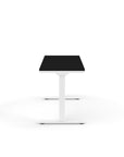 Side view of the Humanscale eFloat Go 2.0 Sit-Stand Desk with black top and white base – Kansas City Office Design