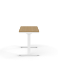 Side view of the Humanscale eFloat Go 2.0 Sit-Stand Desk with bamboo top and white base – Kansas City Office Design