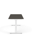 Side view of the Humanscale eFloat Go 2.0 Sit-Stand Desk with grey top and white base – Kansas City Office Design