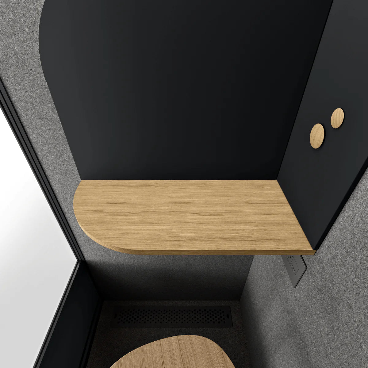 Inside view of the Black Room Phone Booth, a soundproof privacy pod with a built-in desk. Kansas City Office Furniture