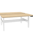 Height Adjustable Benching Workstation in white frame and maple tops - Kansas City Office Furniture