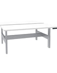 HAT Collective Height adjustable benching station with Silver Base and Designer White Tops. Kansas City Office Design