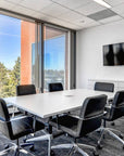 Conference room with Diddy Conference Chair with black fabric seat & back, polished aluminum frame. Ergonomic Desk chair Kansas City, Missouri.