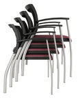 Grafton Side Chair stacked 4 high with Black fabric seat, mesh back, and Silver frame. Side chair Kansas City, Missouri.