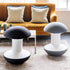 Two modern Humanscale Ballo stools with textured tops in a living room setting. In black and gray finish. Kansas City Office Design.