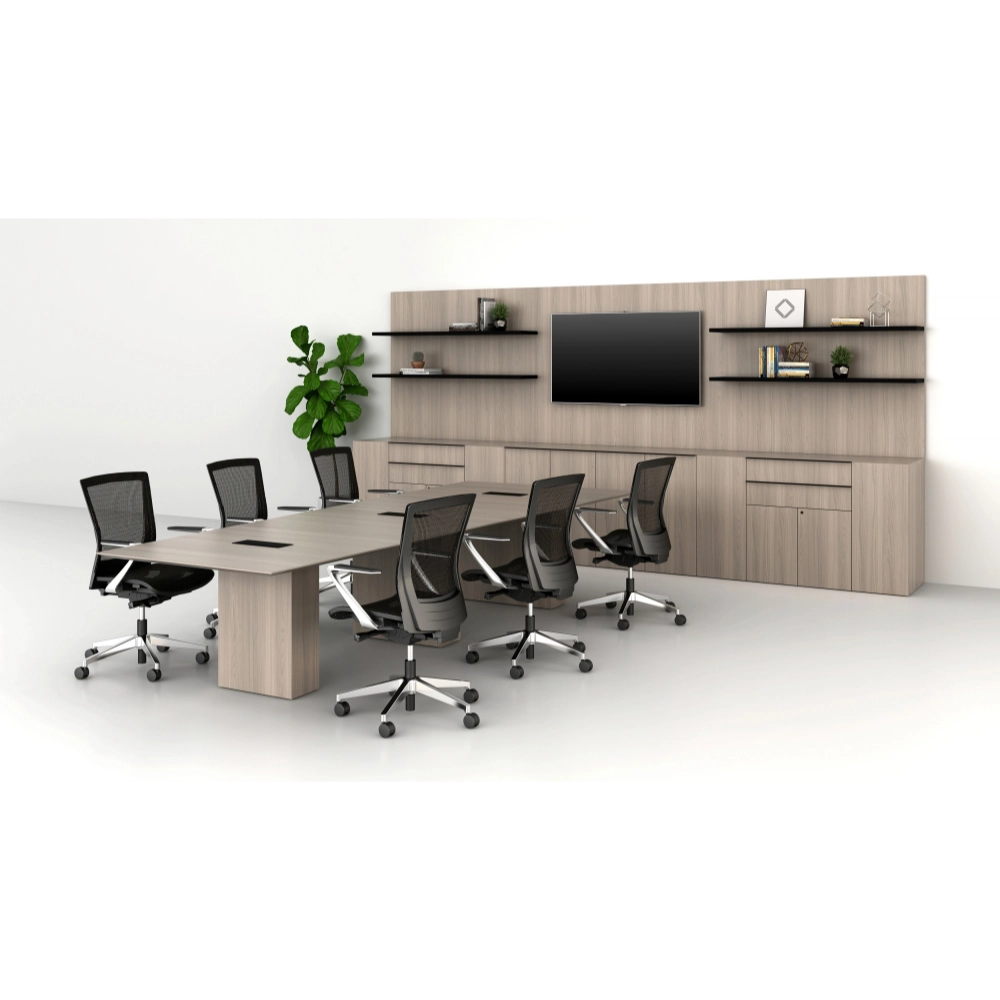 Modern office setup with a long desk, chairs, and wall-mounted shelves. Kansas City Office Design.