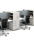 Modern office cubicles with desks, chairs, and computer monitors on a white background. Kansas City Office Design