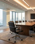 Alba Conference Chair in a modern conference room overlook the city with glass walls. Kansas City Office Design.