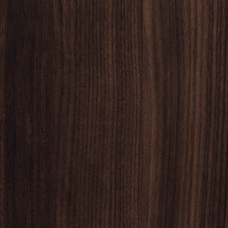 Close-up of a Uptown Colombian Laminate with a dark brown color and visible grain pattern. Kansas City Office Design.